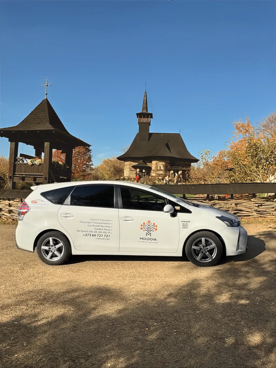 Prius+ at a wooden skete